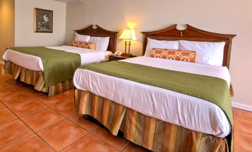 Imagen de la habitación del Hotel Tidelands Caribbean Boardwalk and Suites. Foto 7