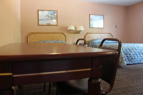 Imagen de la habitación del Hotel Tides Motor Inn. Foto 8