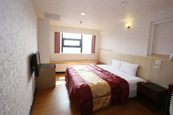 Imagen de la habitación del Hotel Tie Dao. Foto 16