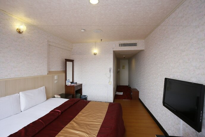 Imagen de la habitación del Hotel Tie Dao. Foto 17