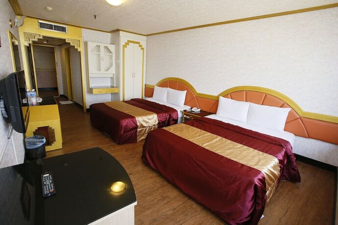 Imagen de la habitación del Hotel Tie Dao. Foto 21