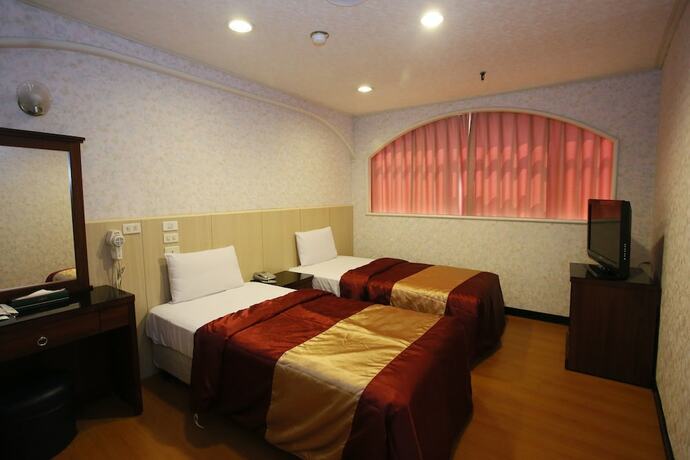 Imagen de la habitación del Hotel Tie Dao. Foto 24