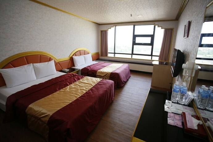 Imagen de la habitación del Hotel Tie Dao. Foto 26