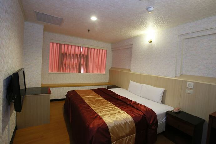 Imagen de la habitación del Hotel Tie Dao. Foto 27