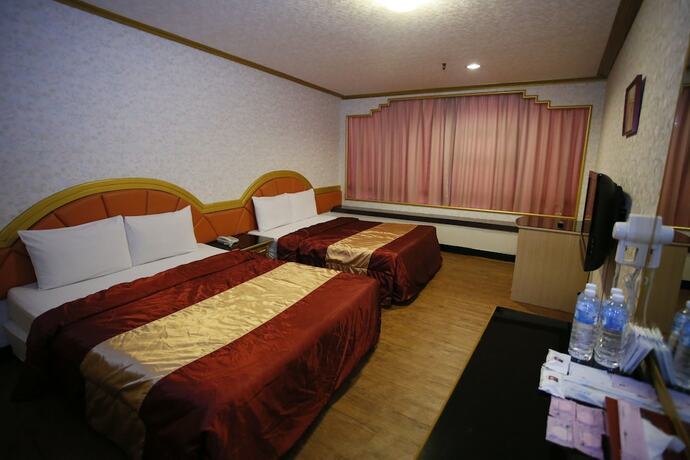 Imagen de la habitación del Hotel Tie Dao. Foto 28