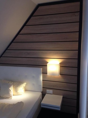 Imagen de la habitación del Hotel Tiek. Foto 15