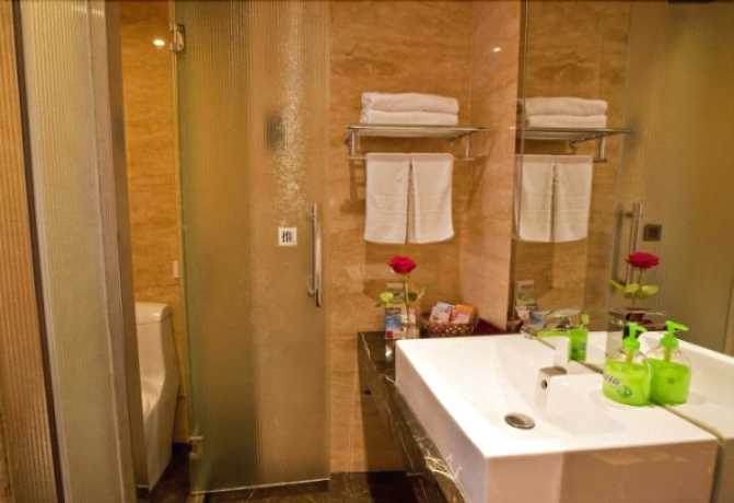 Imagen de la habitación del Hotel Tieliu Business. Foto 5
