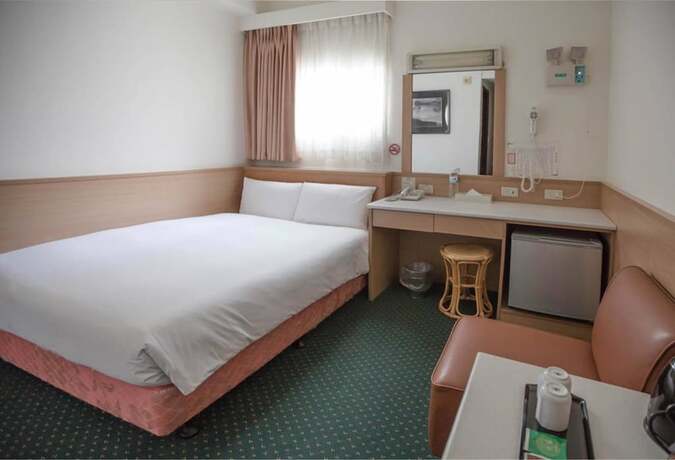 Imagen de la habitación del Hotel Tien Chin. Foto 4