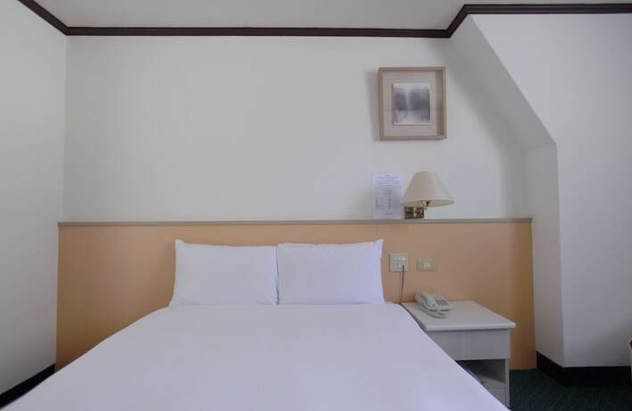 Imagen de la habitación del Hotel Tien Chin. Foto 5