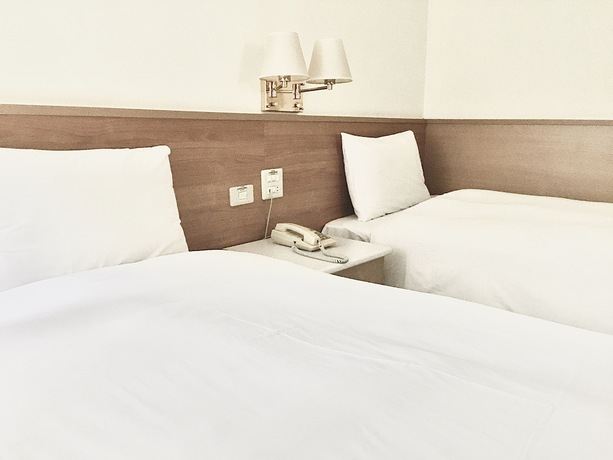 Imagen de la habitación del Hotel Tien Chin. Foto 6