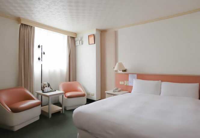 Imagen de la habitación del Hotel Tien Chin. Foto 8