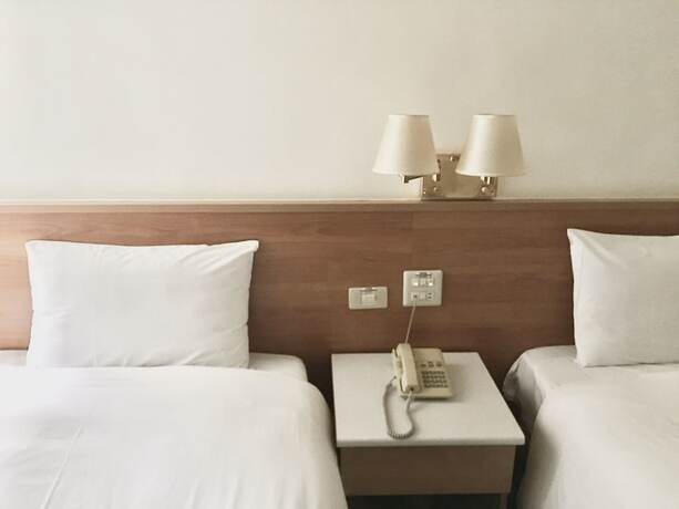 Imagen de la habitación del Hotel Tien Chin. Foto 15