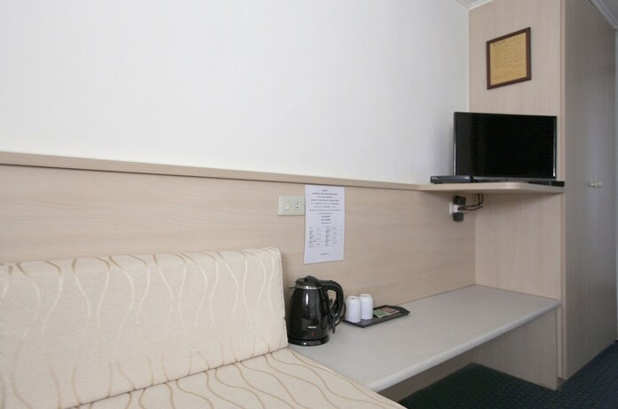 Imagen de la habitación del Hotel Tien Chin. Foto 16