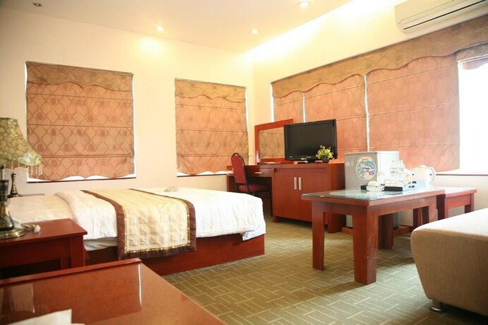 Imagen de la habitación del Hotel Tien Thanh. Foto 11