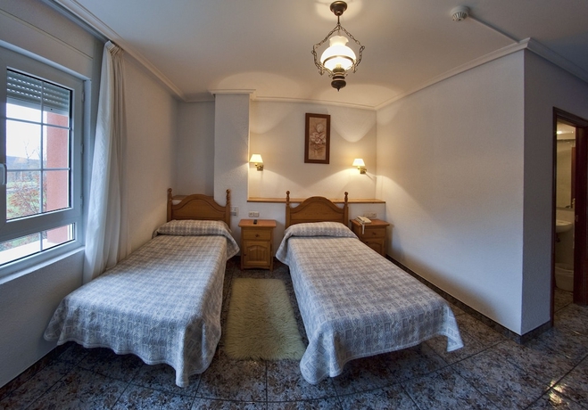 Imagen de la habitación del Hotel Tierra De La Reina. Foto 8