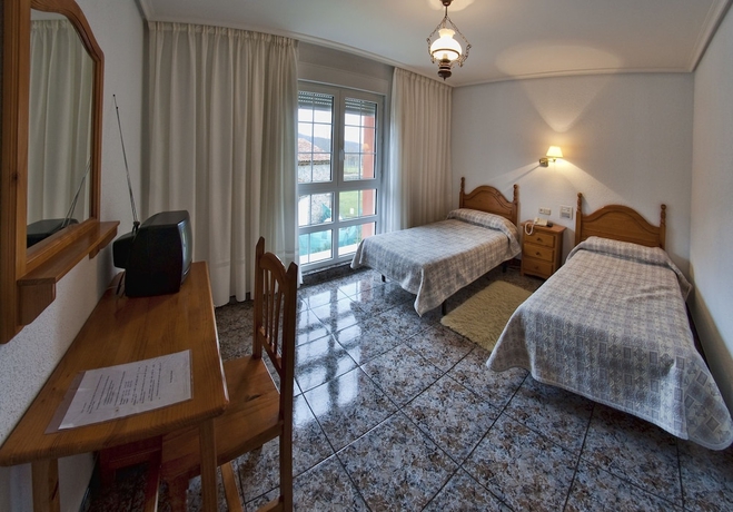 Imagen de la habitación del Hotel Tierra De La Reina. Foto 10