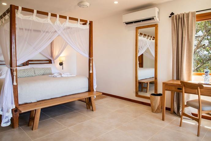 Imagen de la habitación del Hotel Tierra Magnifica Boutique. Foto 12