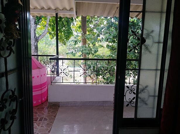 Imagen de la habitación del Hotel Tierralinda Finca Cottage. Foto 18