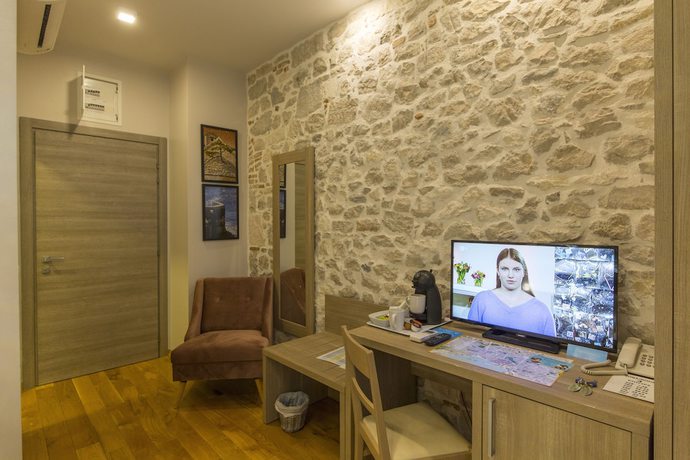 Imagen de la habitación del Hotel Tifani Luxury Rooms. Foto 4