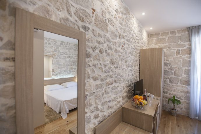 Imagen de la habitación del Hotel Tifani Luxury Rooms. Foto 5