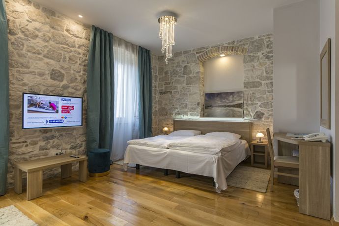 Imagen de la habitación del Hotel Tifani Luxury Rooms. Foto 6