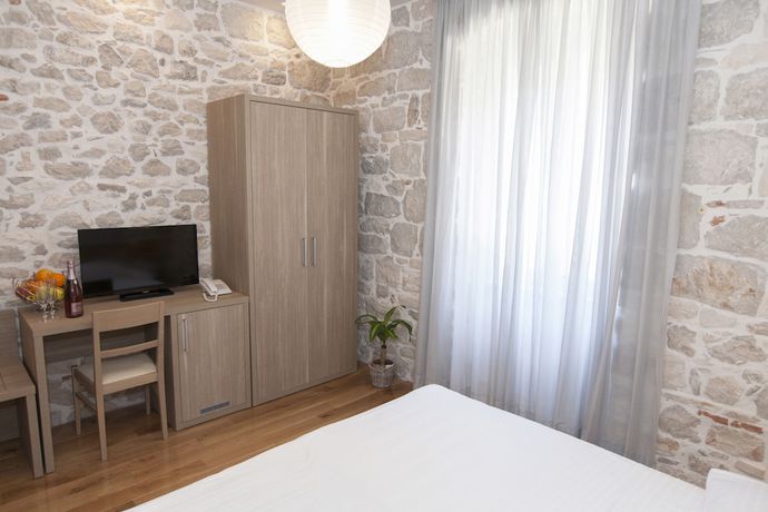 Imagen de la habitación del Hotel Tifani Luxury Rooms. Foto 10