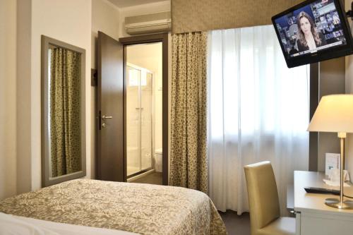 Imagen de la habitación del Hotel Tiffany, Marina di Massa. Foto 7