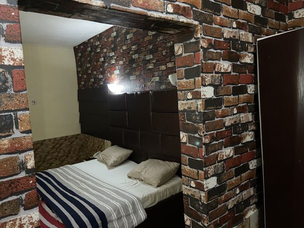 Imagen de la habitación del Hotel Tiffany and Towers. Foto 11