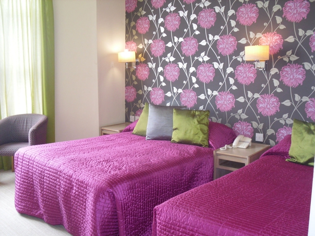 Imagen de la habitación del Hotel Tiffanys. Foto 7
