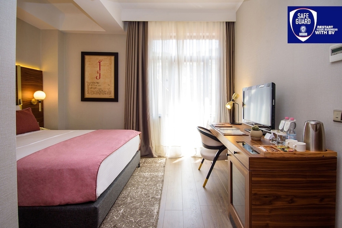 Imagen de la habitación del Hotel Tiflis Palace. Foto 6