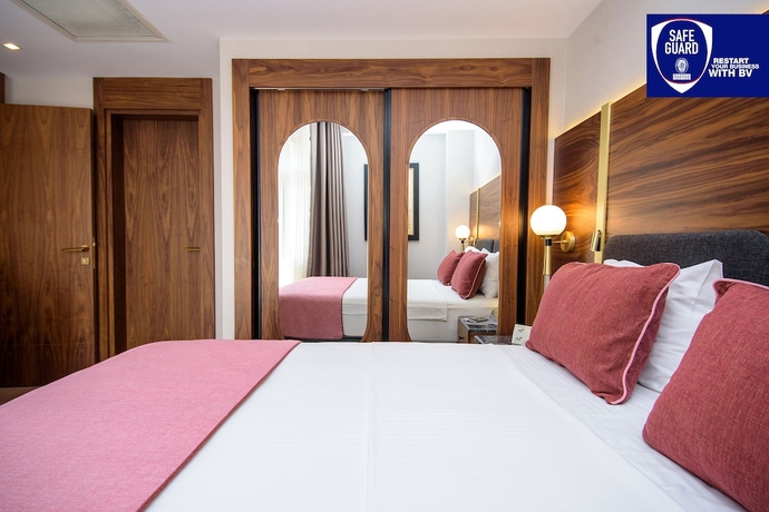 Imagen de la habitación del Hotel Tiflis Palace. Foto 8