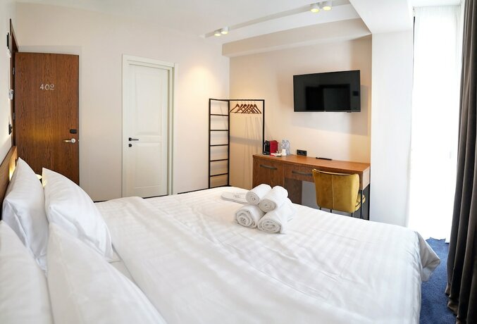 Imagen de la habitación del Hotel Tiflisi Inn. Foto 16