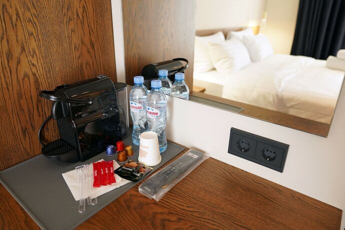 Imagen de la habitación del Hotel Tiflisi Inn. Foto 18