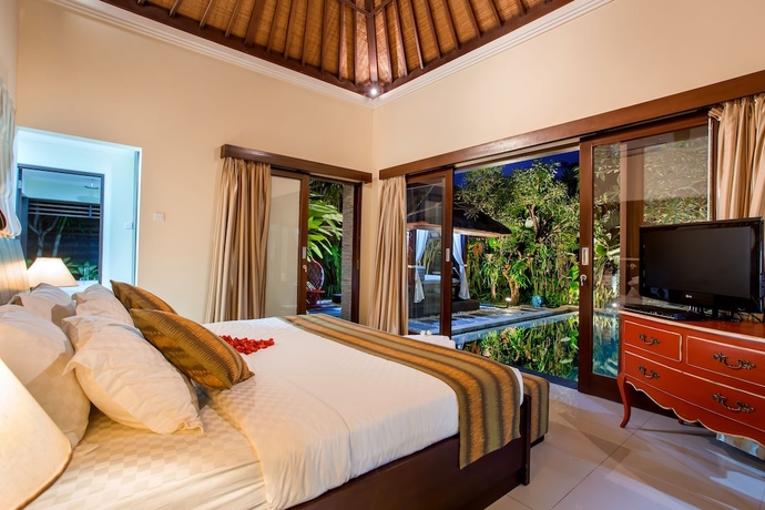 Imagen de la habitación del Hotel Tiga Samudra Villa. Foto 16