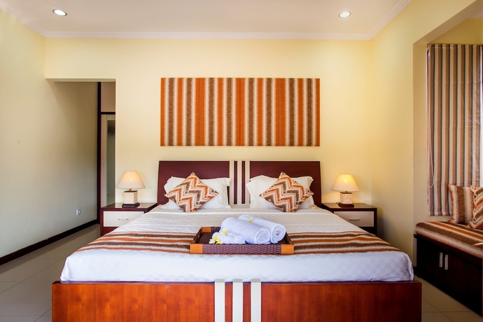 Imagen de la habitación del Hotel Tiga Samudra Villa. Foto 17