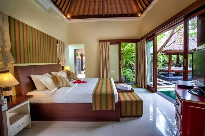 Imagen de la habitación del Hotel Tiga Samudra Villa. Foto 19