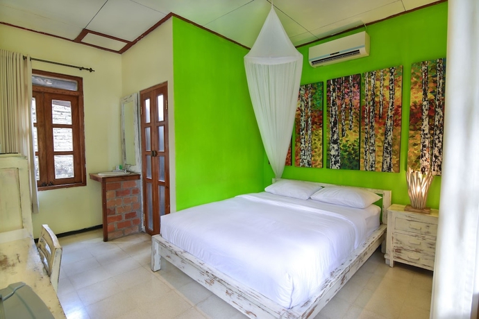 Imagen de la habitación del Hotel Tigalima Homestay. Foto 2