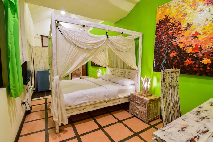 Imagen de la habitación del Hotel Tigalima Homestay. Foto 3