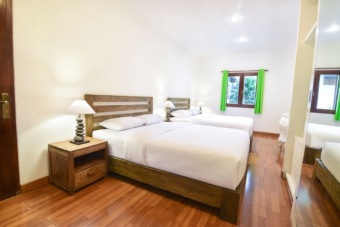 Imagen de la habitación del Hotel Tigalima Homestay. Foto 6