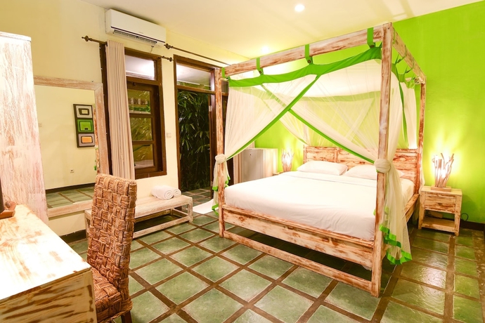 Imagen de la habitación del Hotel Tigalima Homestay. Foto 11