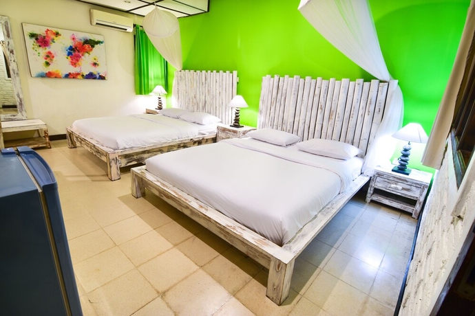 Imagen de la habitación del Hotel Tigalima Homestay. Foto 14