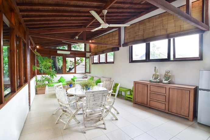 Imagen de la habitación del Hotel Tigalima Homestay. Foto 18