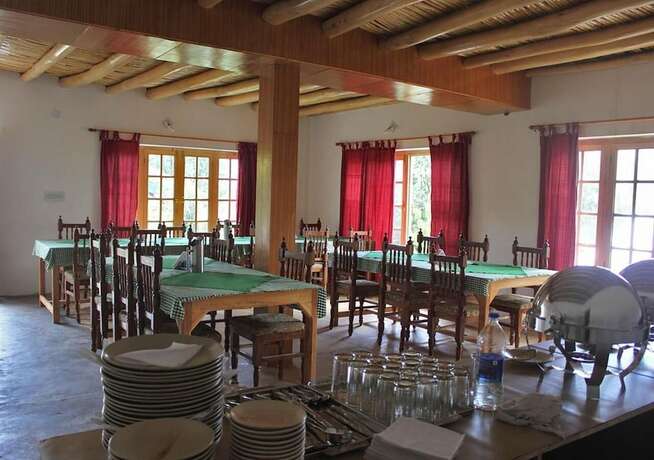 Imagen del bar/restaurante del Hotel Tiger Camp. Foto 18