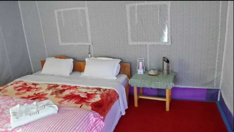 Imagen de la habitación del Hotel Tiger Camp. Foto 19