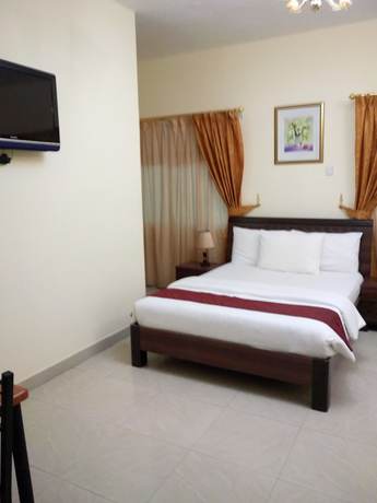 Imagen de la habitación del Hotel Tiger Home Apartment. Foto 5
