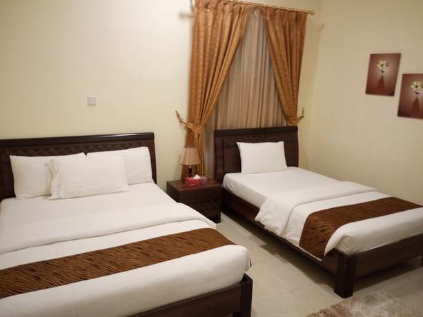 Imagen de la habitación del Hotel Tiger Home Apartment. Foto 6