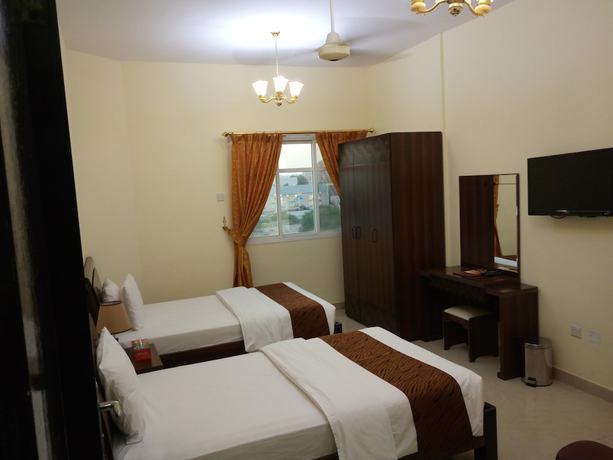 Imagen de la habitación del Hotel Tiger Home Apartment. Foto 7