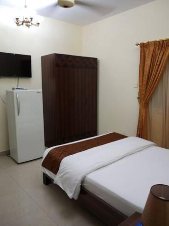 Imagen de la habitación del Hotel Tiger Home Apartment. Foto 10