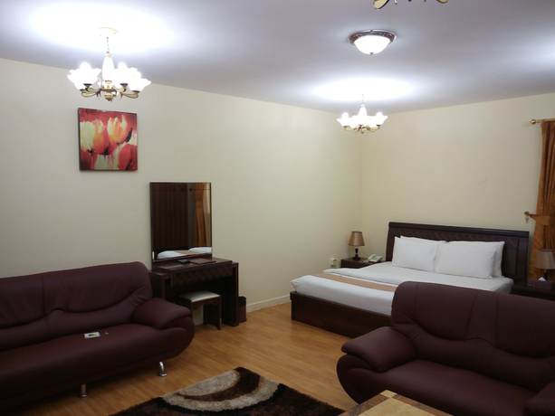 Imagen de la habitación del Hotel Tiger Home Apartment. Foto 12