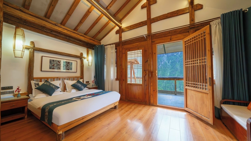 Imagen de la habitación del Hotel Tiger Leaping Gorge yachajiao Manor. Foto 2